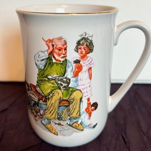 Norman Rockwall The Cobbler Coffee Tall Coffee Cup by Museum Collections, Inc.
